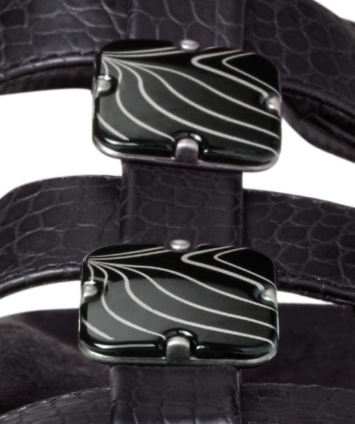 The vamp includes removable enamel beading for extra style Detail of the Beading on the Rest Amber Sandals
